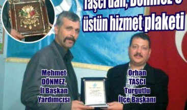 Taşcı’dan, Dönmez’e üstün hizmet plaketi